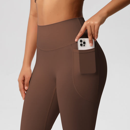 Yogabyxor dam med fickor – enfärgade tights med borstad insida