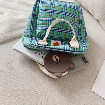 Vattentålig ryggsäck för barn – slitstark canvas, rutmönster och smart förvaring