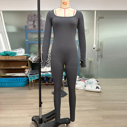 Figurformande träningsjumpsuit